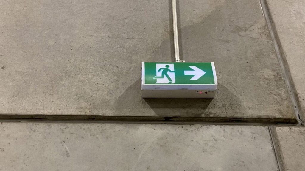 Electric-Battery Exit Sign in Warehouse