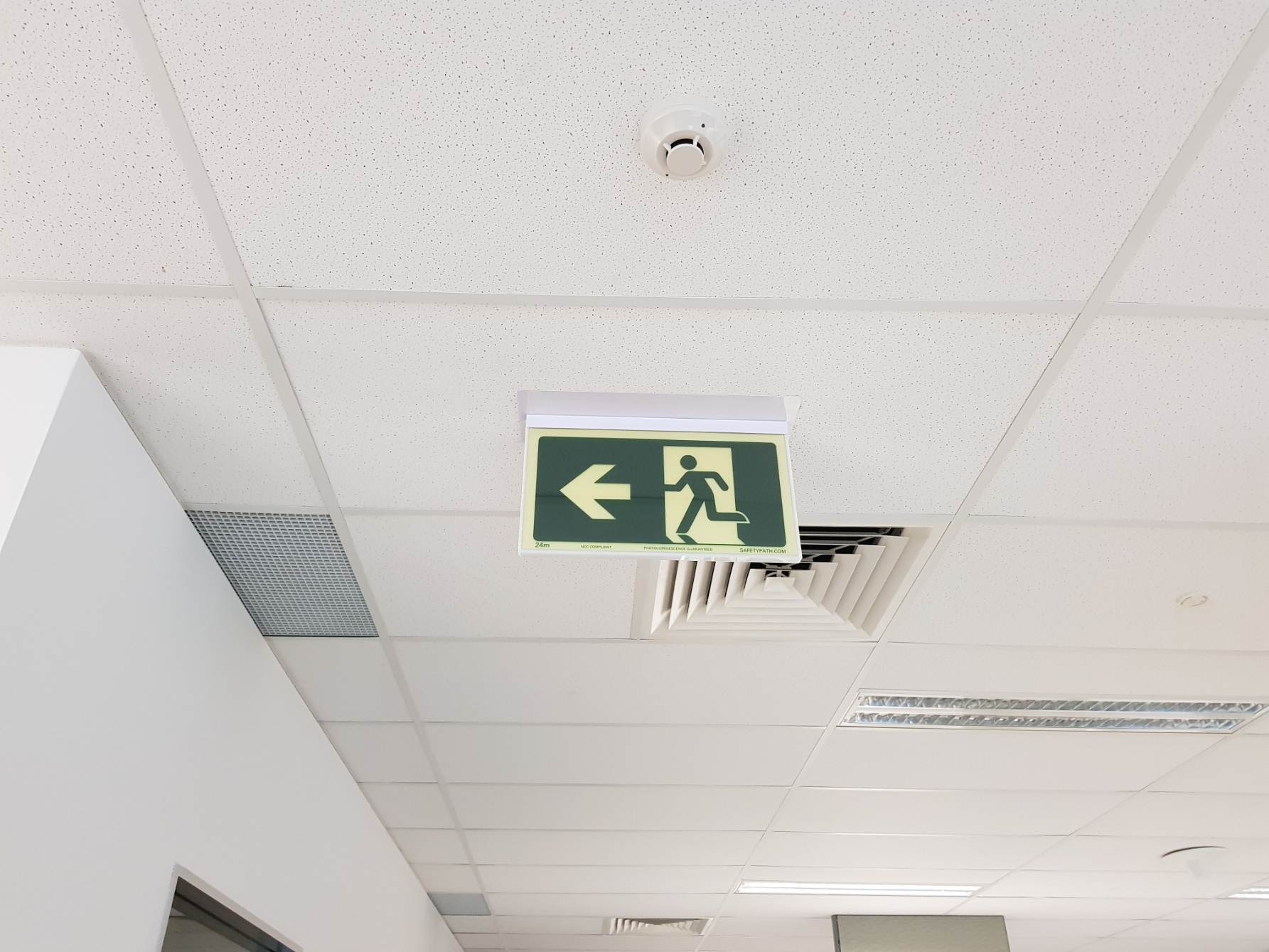 Safety Path Exit Sign in office building