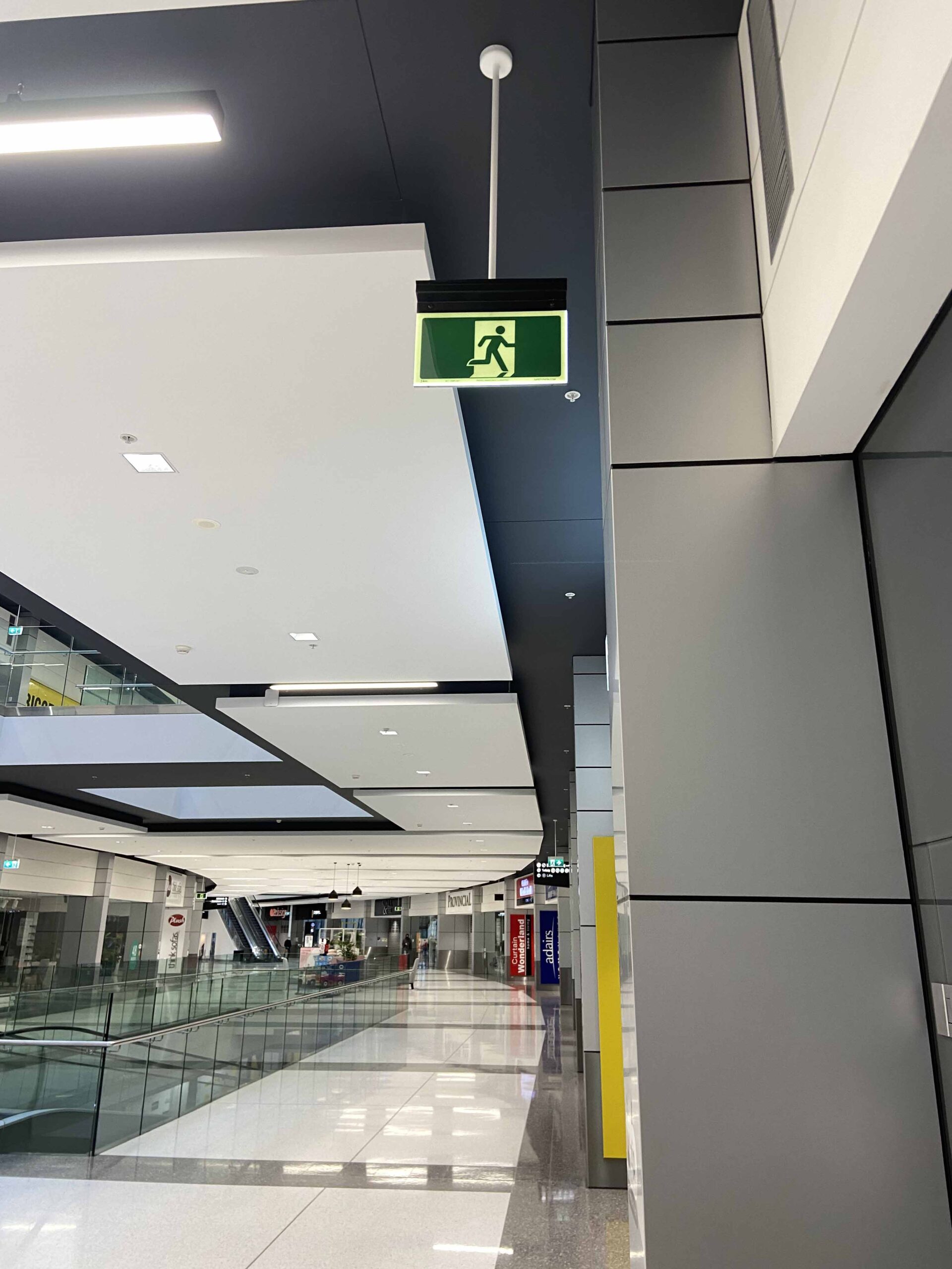 Safety Path Exit Sign in Retail Shopping Centre