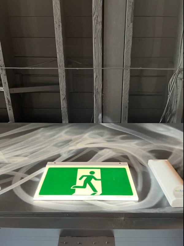 Slim Safety Path LED hybrid exit sign in bar of Prince of Wales Hotel in Richmond Melbourne
