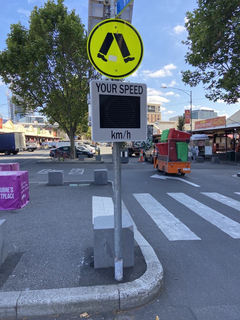 Vivacity LED Speed Check Sign at pedestrian crossing in Queen Victoria Market in Melbourne Australia